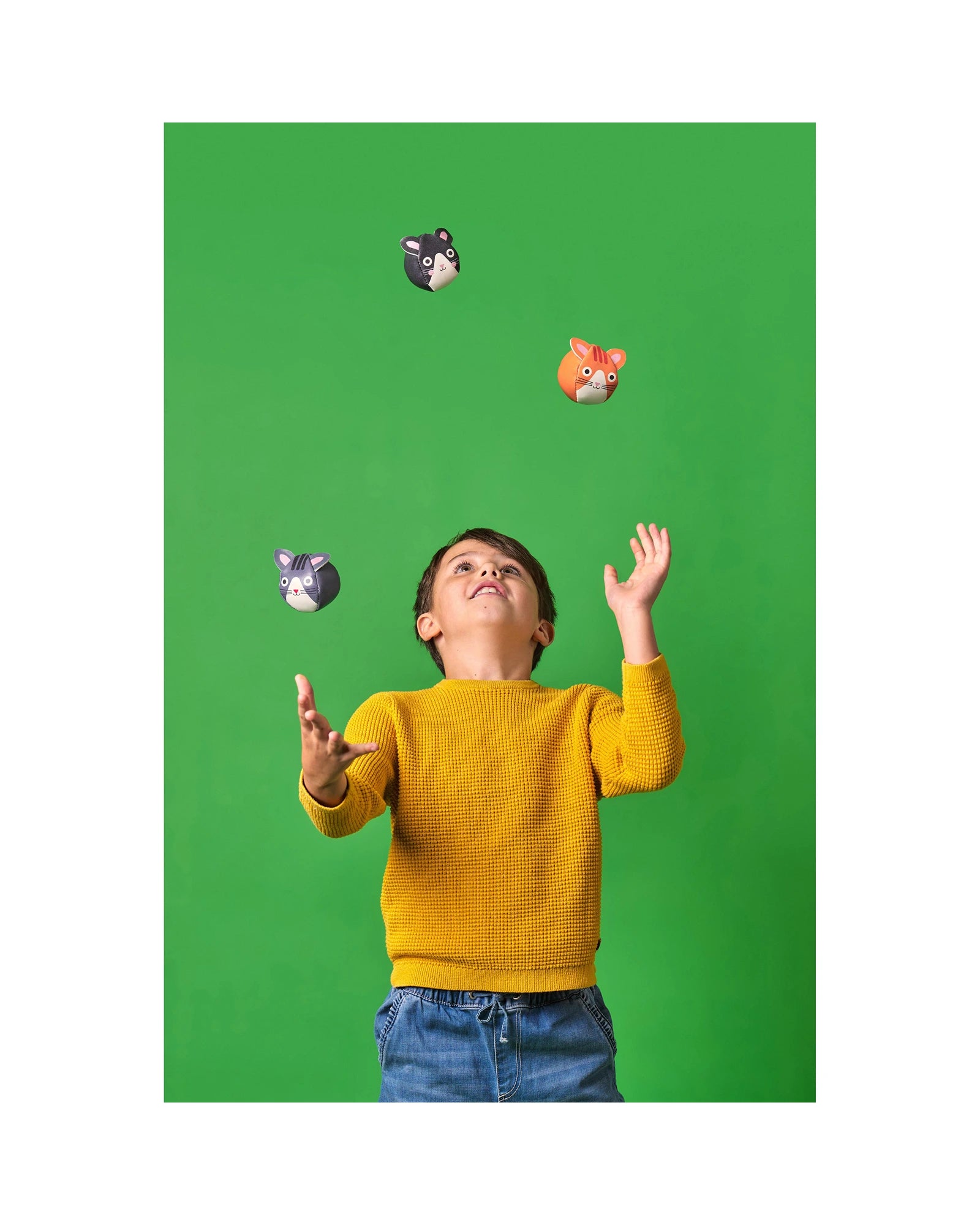 Three Cats Juggling Balls